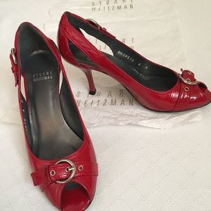 Stuart Weitzman red heels.